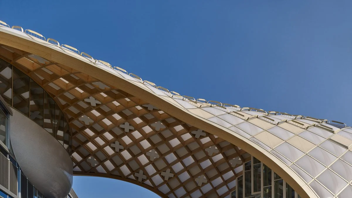 Shigeru Ban covers Swatch headquarters in snaking timber vault
