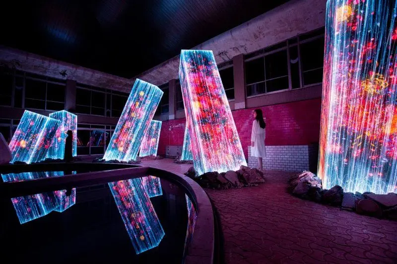 Digitally Activated Megaliths Rise Inside an Abandoned Bath House in TeamLab’s Latest Installation