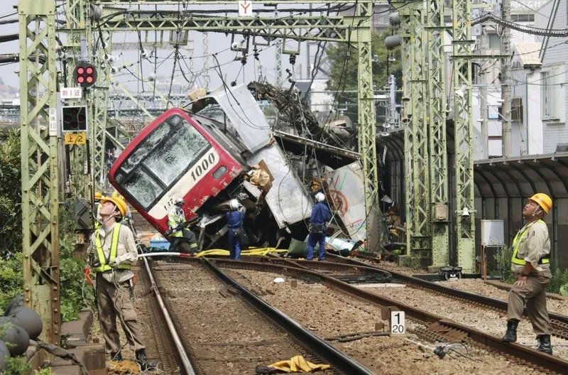 1 dead, 33 injured as train derails after hitting truck in Yokohama
